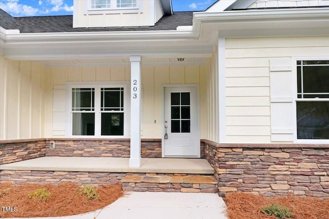 doorway to property featuring a porch