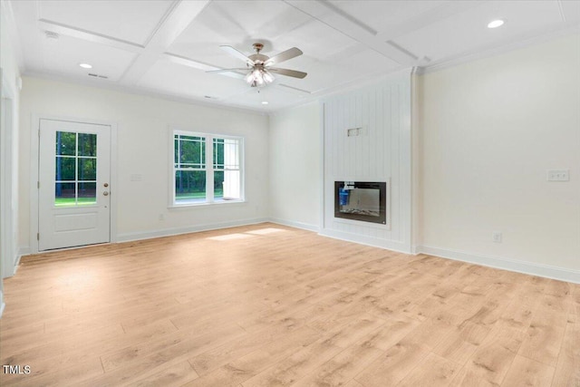 unfurnished living room featuring light hardwood / wood-style floors, ceiling fan, coffered ceiling, and a large fireplace