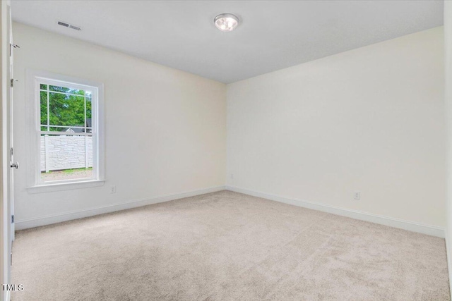 view of carpeted spare room