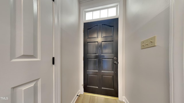 entryway with light hardwood / wood-style floors