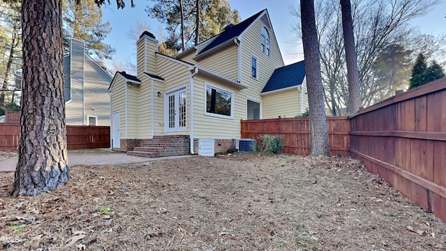 back of house featuring a patio and central AC