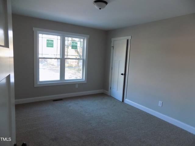 view of carpeted spare room