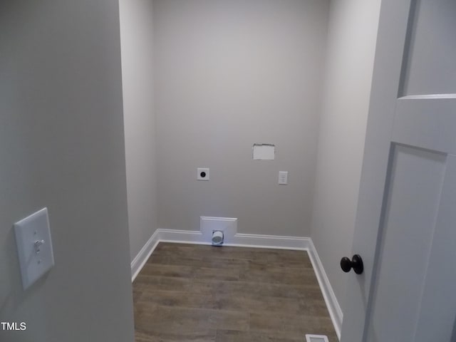 laundry room featuring dark wood-type flooring and hookup for an electric dryer