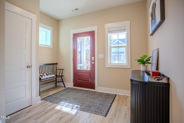 foyer with light wood-type flooring