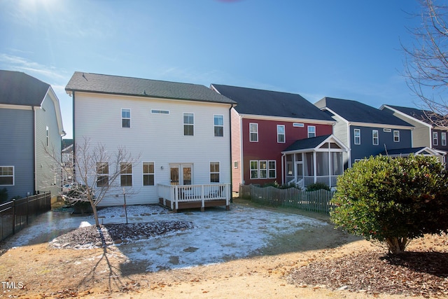 rear view of property with a deck