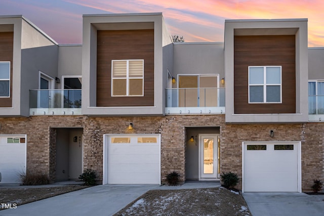 view of front of property with a garage