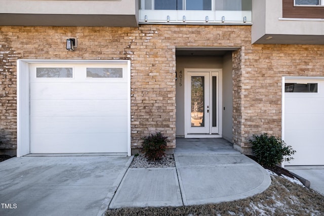 entrance to property featuring a garage