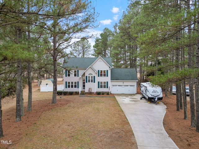 colonial home featuring a garage