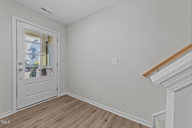 doorway to outside featuring light hardwood / wood-style floors