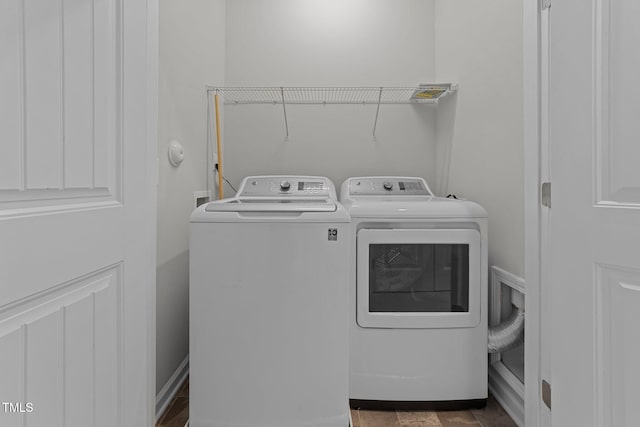 washroom with washer and clothes dryer