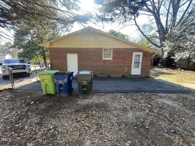 view of property exterior featuring a patio area