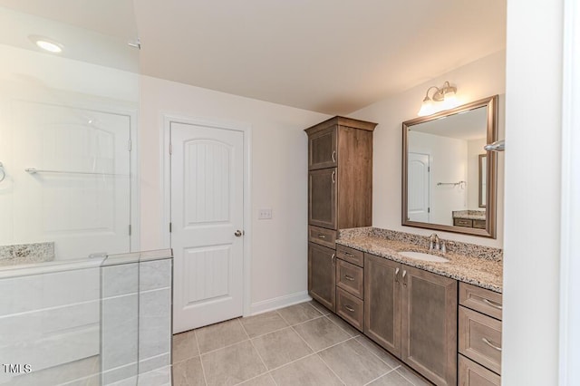 bathroom with vanity and tile patterned floors