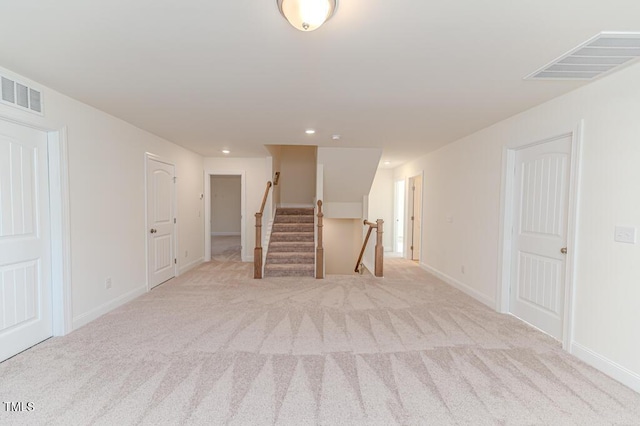 basement with light carpet