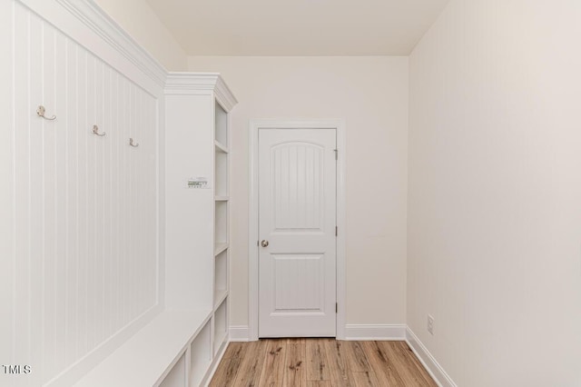 mudroom with light hardwood / wood-style flooring