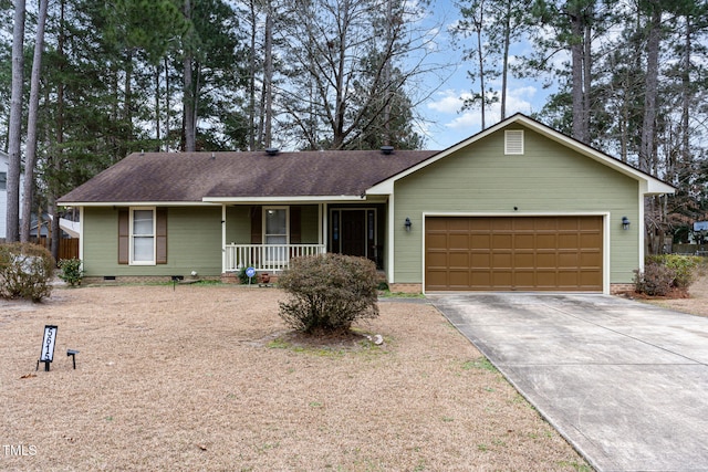 ranch-style home with a garage and a porch