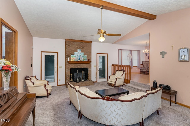 carpeted living room with a brick fireplace, vaulted ceiling with beams, baseboards, ceiling fan with notable chandelier, and a textured ceiling