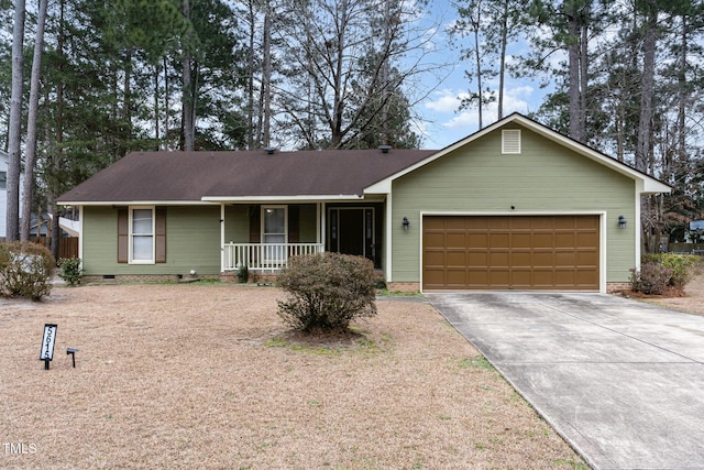 ranch-style house featuring crawl space, a garage, a porch, and driveway