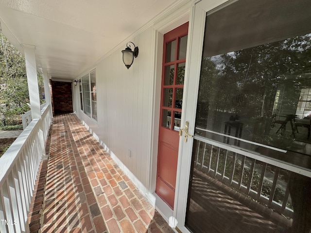 balcony featuring a porch