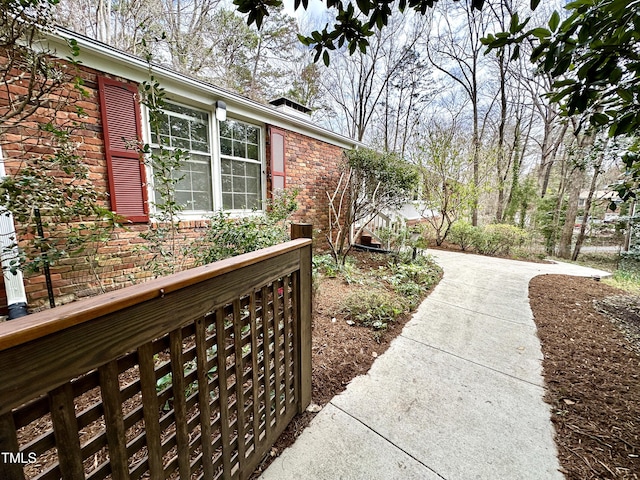 exterior space featuring brick siding