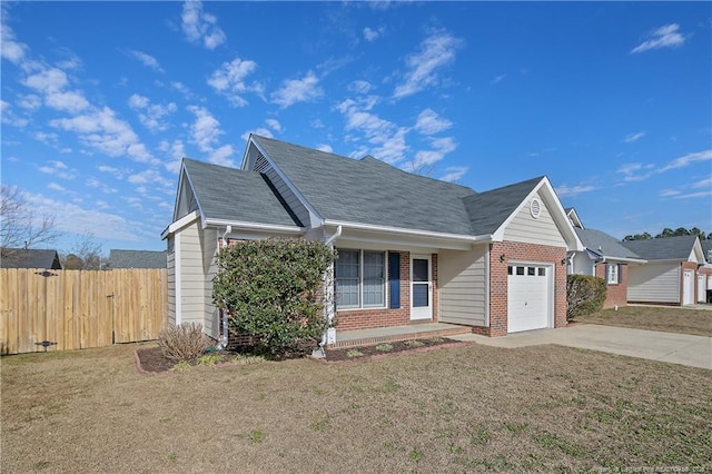 view of front facade with a front yard, a garage, and a porch