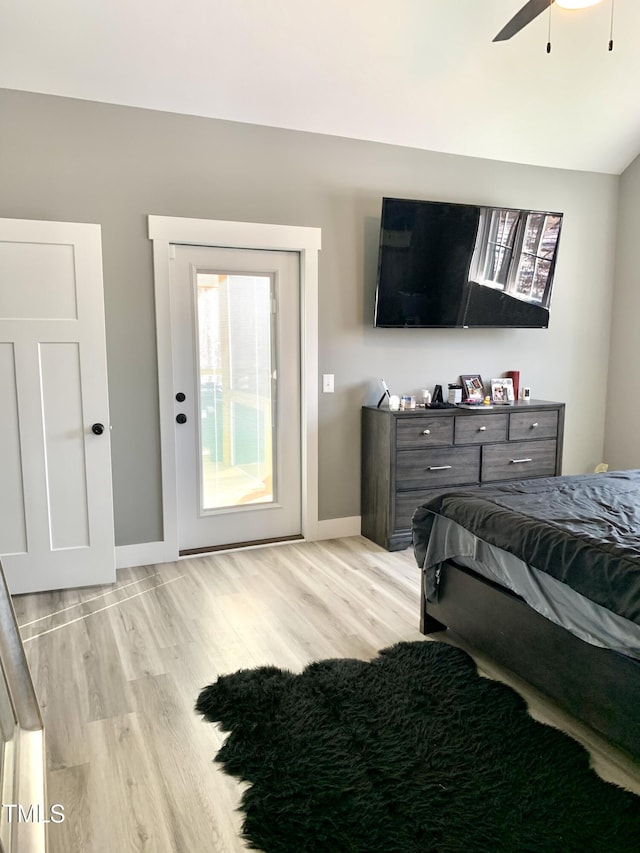 bedroom with ceiling fan and light hardwood / wood-style flooring