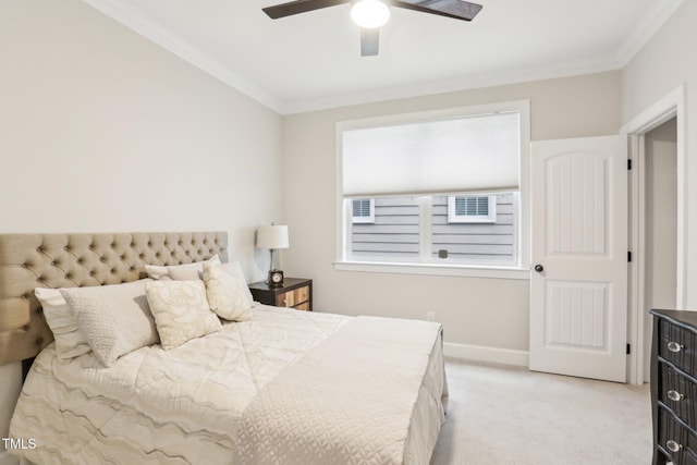 bedroom featuring light colored carpet, a ceiling fan, crown molding, and baseboards