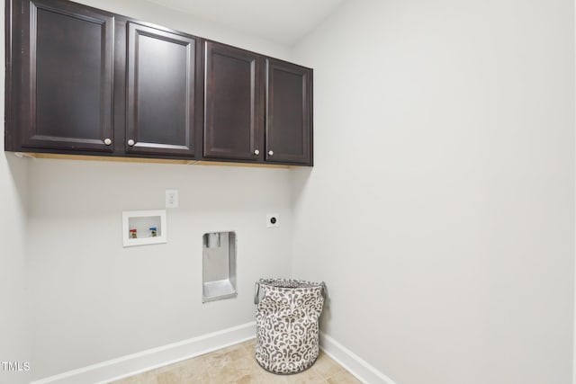 washroom featuring hookup for a washing machine, cabinet space, baseboards, and electric dryer hookup