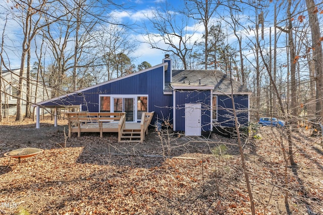 rear view of house with a deck