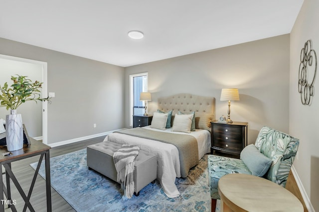 bedroom featuring wood-type flooring