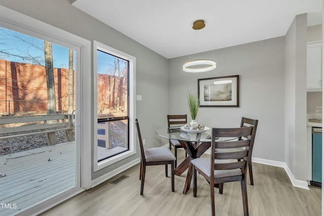 dining area featuring light hardwood / wood-style floors