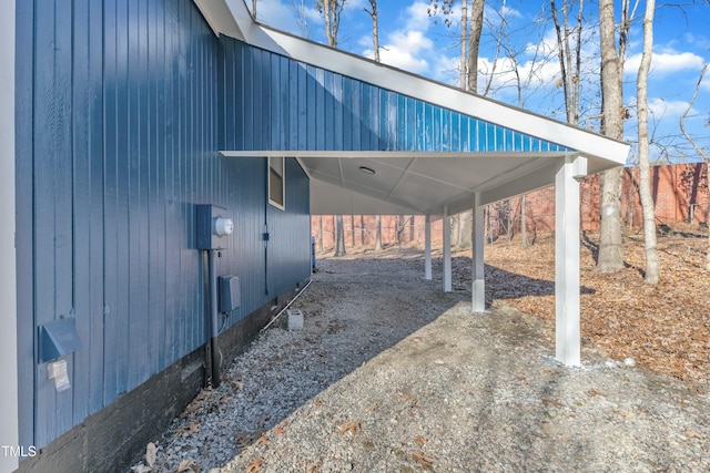 view of parking with a carport