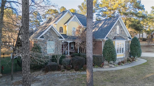 view of front of property with a front lawn