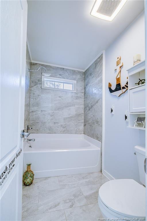 bathroom with shower / tub combination and toilet