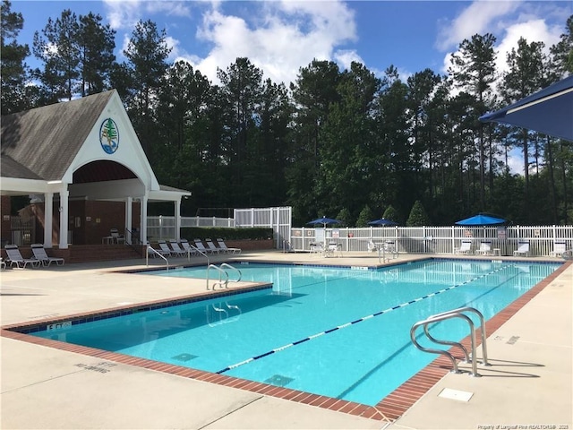 view of pool featuring a patio area