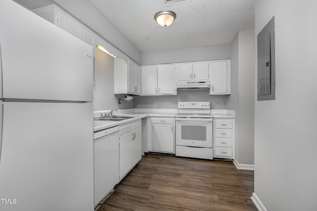 kitchen featuring sink, white appliances, white cabinetry, and a textured ceiling