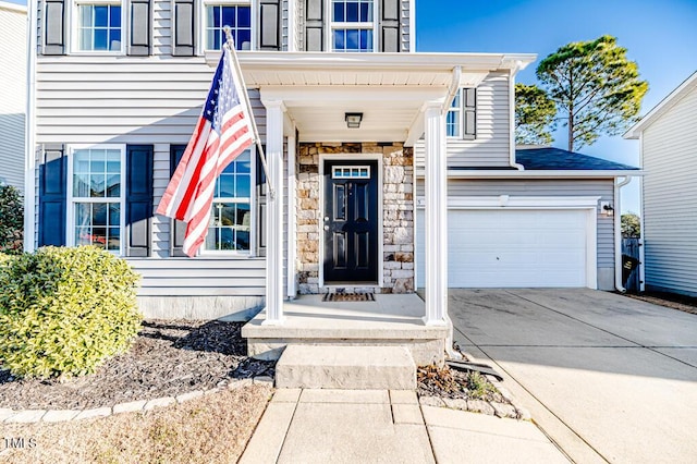 property entrance with a garage