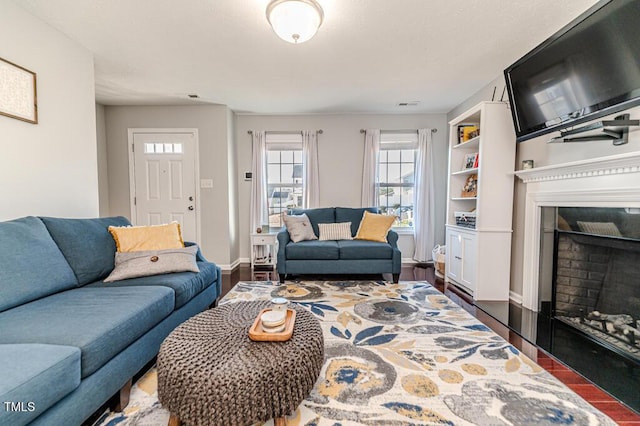 living room with dark hardwood / wood-style floors