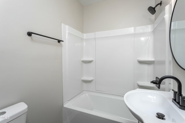 bathroom with a sink and toilet