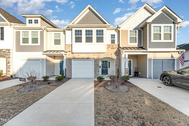 townhome / multi-family property featuring a garage