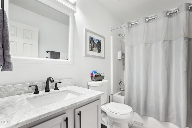 full bathroom with toilet, vanity, and shower / tub combo with curtain