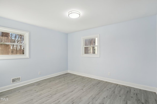 empty room featuring light hardwood / wood-style flooring