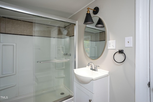 full bath featuring a stall shower and vanity