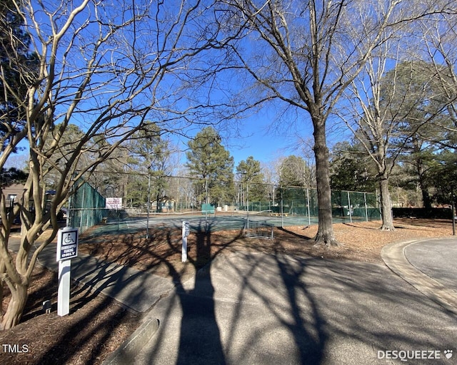 exterior space featuring tennis court