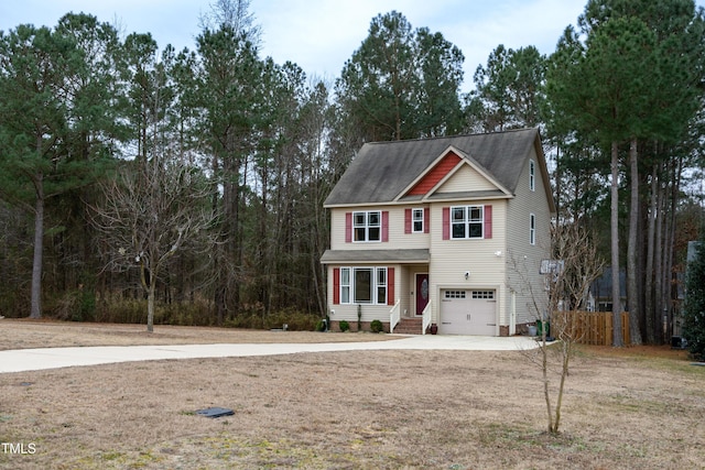 view of front of property featuring a garage