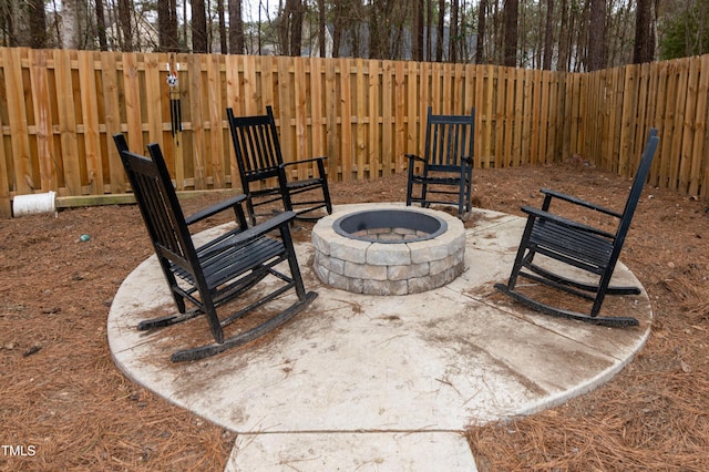 view of patio featuring a fire pit