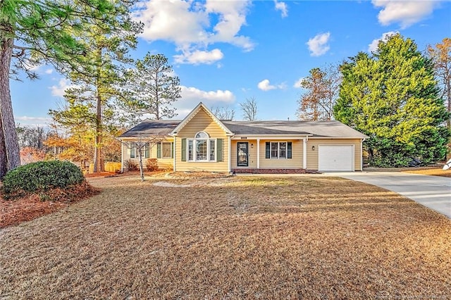 ranch-style home featuring a garage