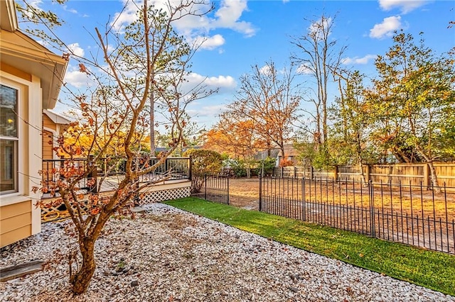 view of yard with a deck