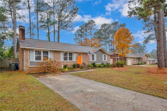 ranch-style house with a front lawn