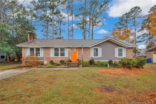 ranch-style house with a front yard