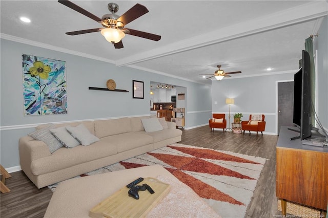 living room with ceiling fan, dark wood-type flooring, and crown molding